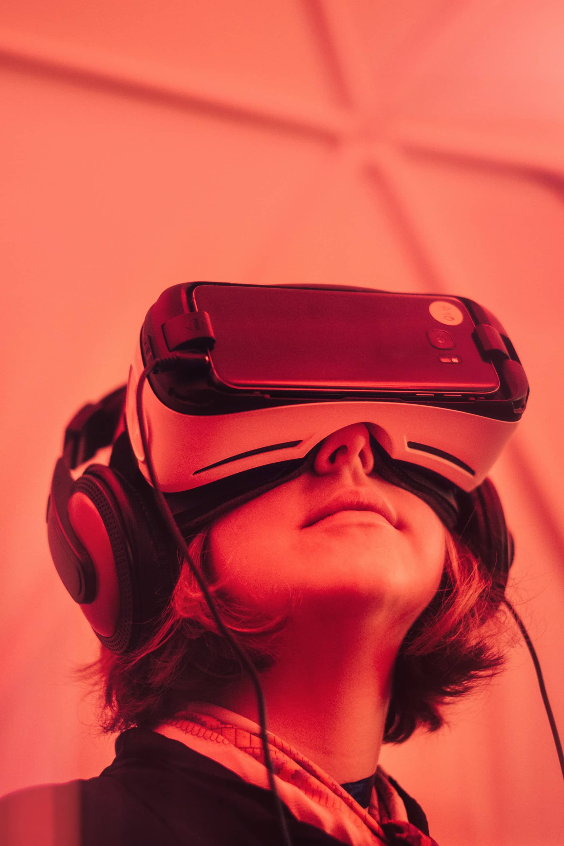 A child wearing VR googles experiencing a virtual reality exhibit
